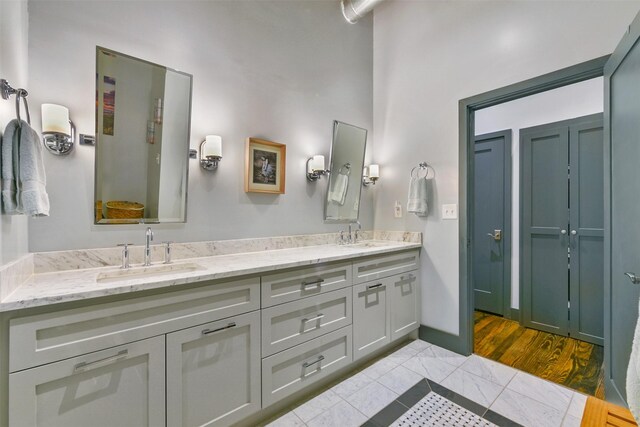 bathroom featuring tile patterned floors and vanity