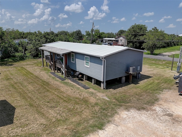 exterior space with a yard