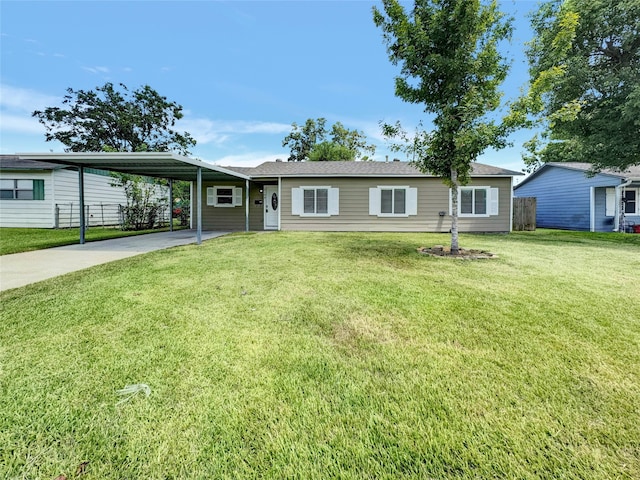 single story home featuring a front lawn and a carport