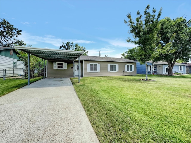 single story home with a carport and a front yard