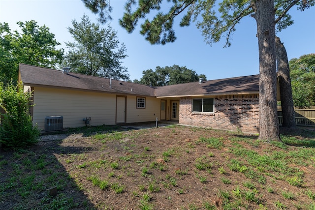 back of property with cooling unit