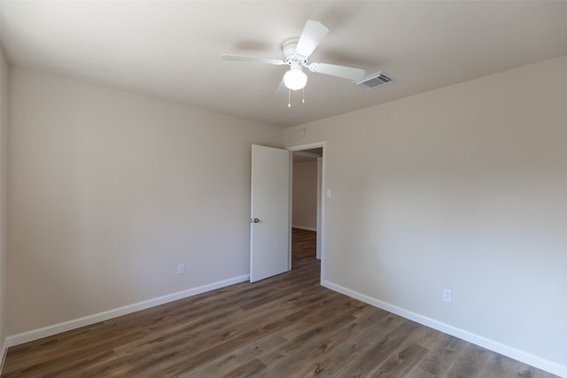 unfurnished room featuring hardwood / wood-style flooring and ceiling fan