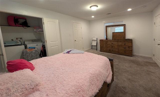 bedroom with carpet and washing machine and clothes dryer