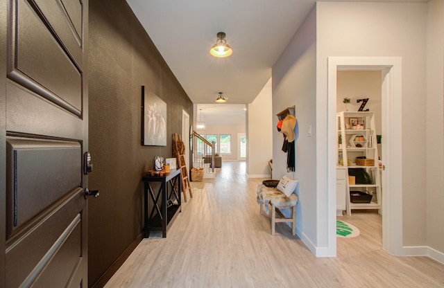 hallway featuring light hardwood / wood-style floors