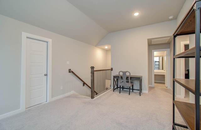 5727 Daylight Cv, Fulshear, TX 77441 - hallway featuring carpet, an upstairs landing, attic access, baseboards, and vaulted ceiling