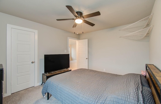 bedroom featuring light carpet and ceiling fan