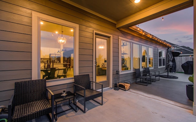 patio terrace at dusk with fence