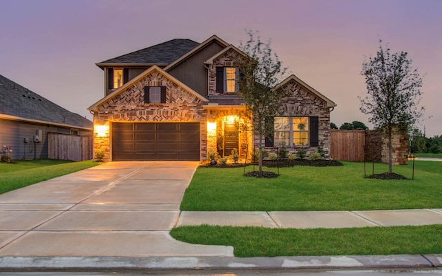 5727 Daylight Cv, Fulshear, TX 77441 - view of front of property featuring concrete driveway and stone siding