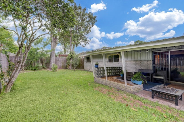 view of yard with a patio area