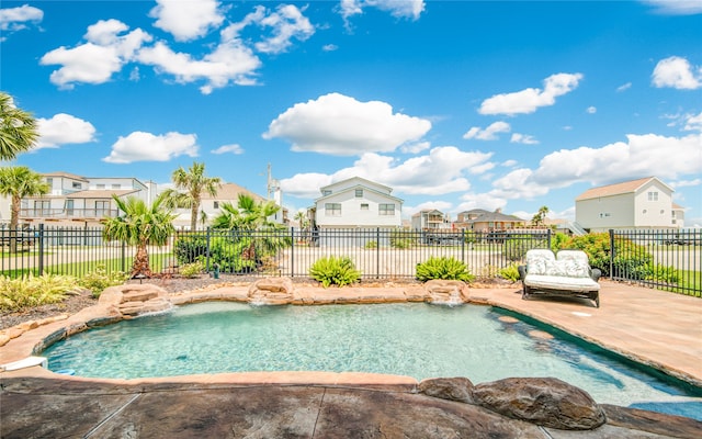 view of pool featuring a patio