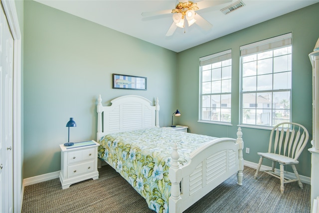 carpeted bedroom featuring ceiling fan