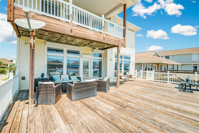 wooden deck with outdoor lounge area