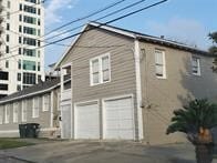 view of side of home with a garage