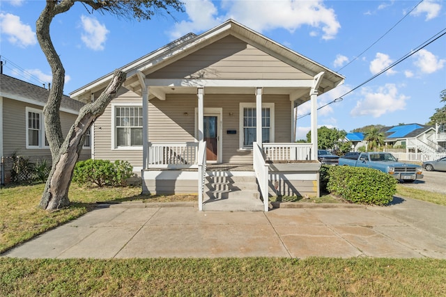 bungalow-style house with covered porch