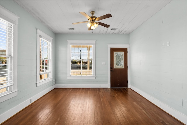 entryway with ceiling fan and dark hardwood / wood-style flooring