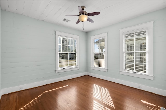 unfurnished room featuring hardwood / wood-style floors and ceiling fan