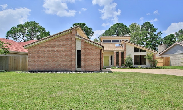 view of property with a front lawn