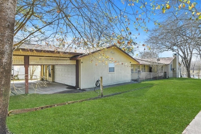 view of home's exterior with a garage and a lawn