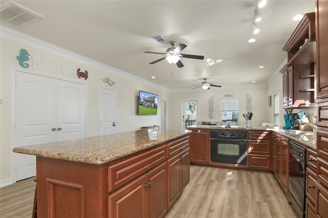 kitchen featuring crown molding, kitchen peninsula, ceiling fan, light hardwood / wood-style floors, and black appliances