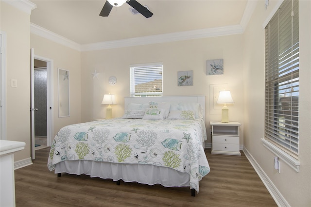 bedroom featuring dark hardwood / wood-style floors, ornamental molding, and ceiling fan