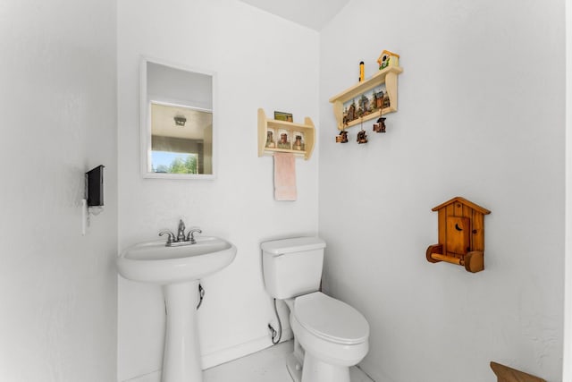 bathroom with a sink and toilet