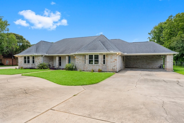 ranch-style house with a front yard and a carport