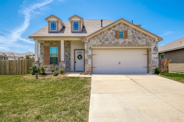 view of front facade featuring a garage and a front lawn