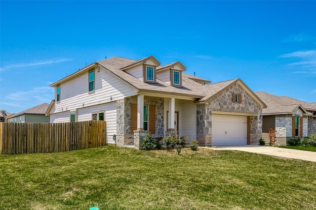 view of front of house with a garage and a front lawn