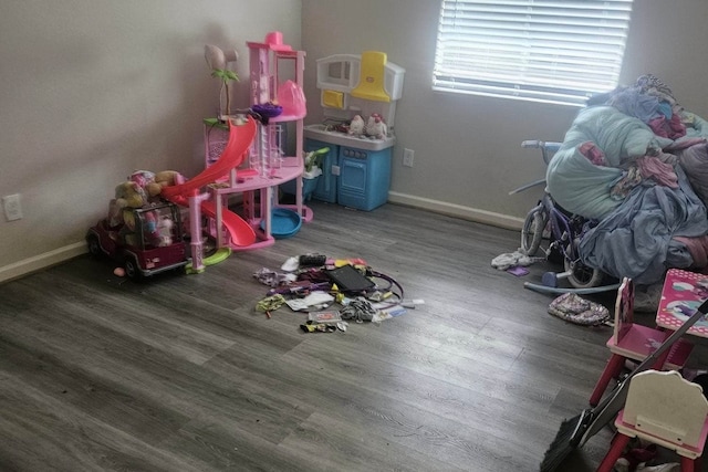 playroom with hardwood / wood-style flooring