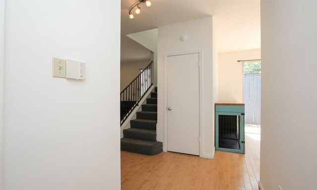 corridor featuring light hardwood / wood-style flooring