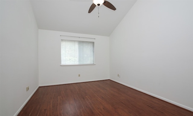 unfurnished room featuring vaulted ceiling, ceiling fan, and dark wood-type flooring