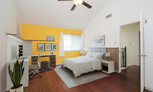 bedroom featuring ceiling fan, dark wood-type flooring, and high vaulted ceiling