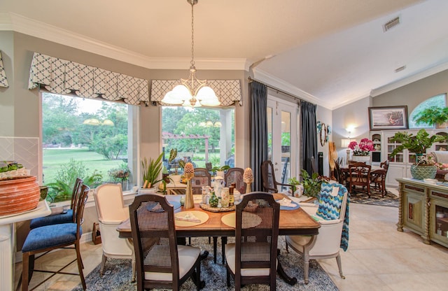 dining area with a chandelier, vaulted ceiling, plenty of natural light, and ornamental molding