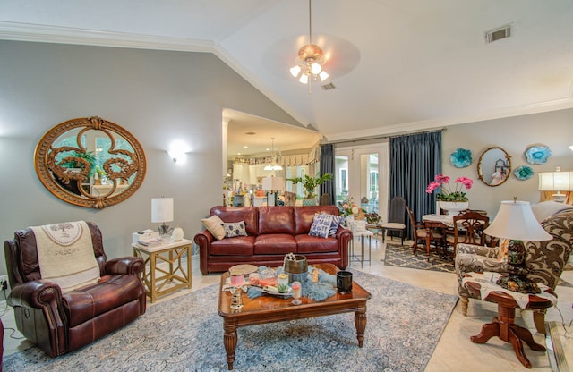 tiled living room with ceiling fan, lofted ceiling, and ornamental molding