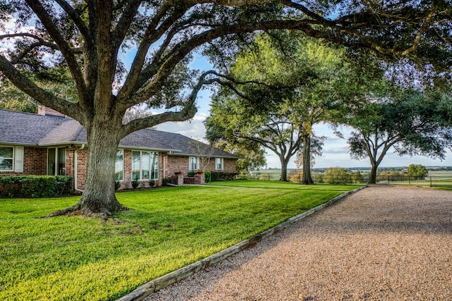 view of front of house with a front lawn