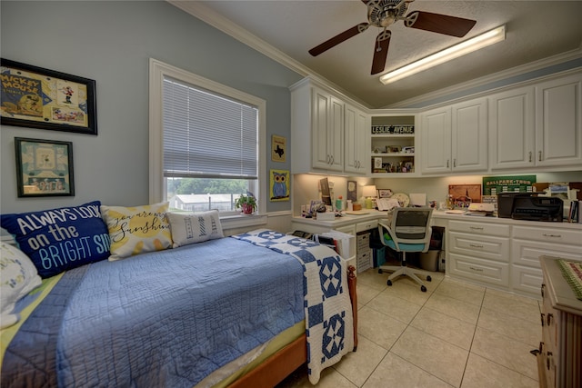 bedroom featuring light tile patterned floors, built in desk, ornamental molding, and ceiling fan