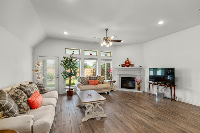 living room with hardwood / wood-style flooring, high vaulted ceiling, and ceiling fan