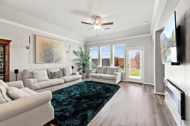 living room featuring light wood-type flooring and ceiling fan