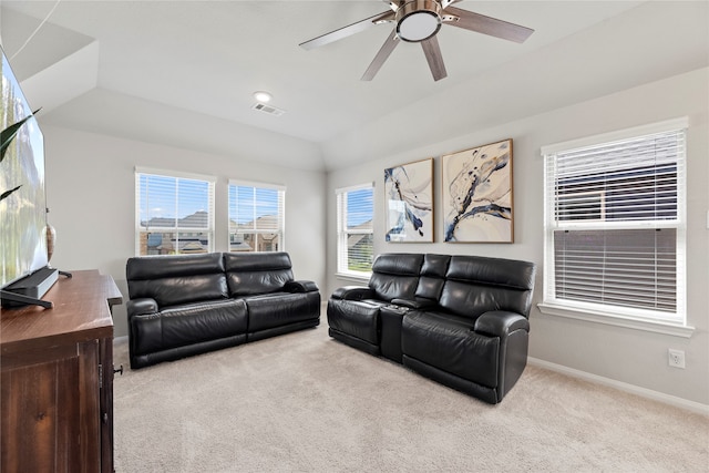 living room featuring ceiling fan and light colored carpet