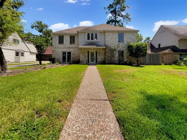 view of front of home featuring a front yard