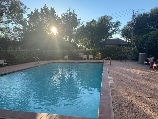 view of swimming pool featuring a patio