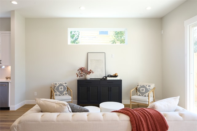 living room featuring light hardwood / wood-style flooring and plenty of natural light