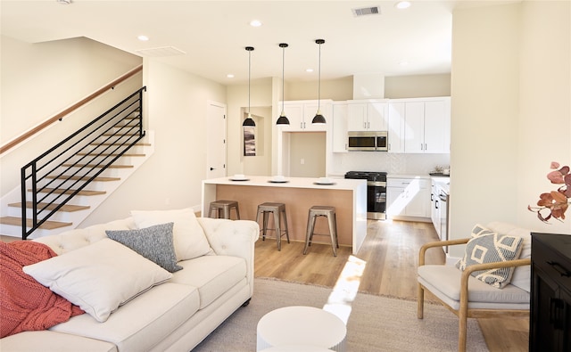 living room featuring light hardwood / wood-style floors