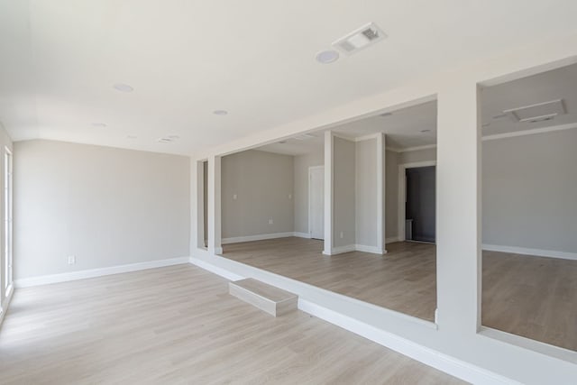 spare room with light wood-type flooring