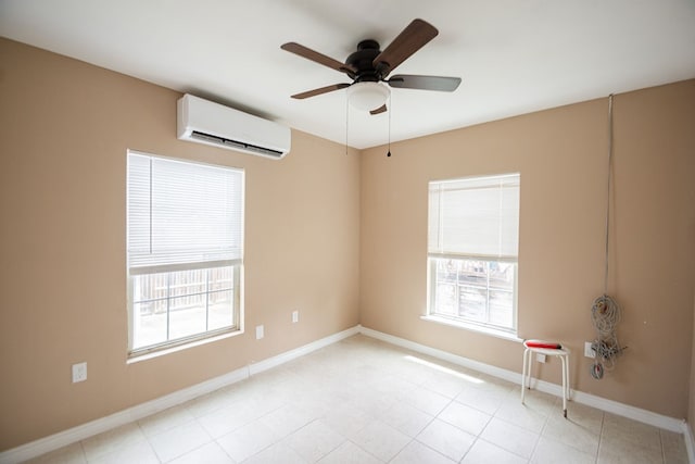 empty room featuring light tile patterned floors, ceiling fan, and a wall unit AC