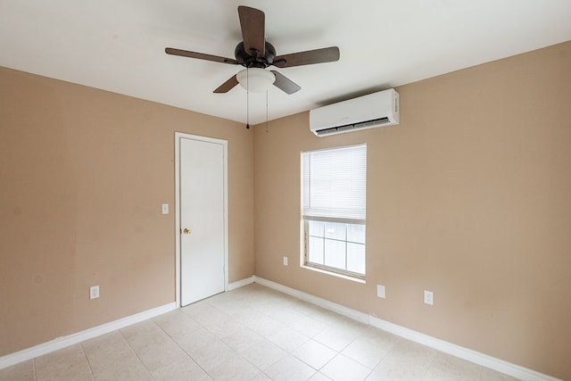 tiled empty room featuring a wall mounted AC and ceiling fan