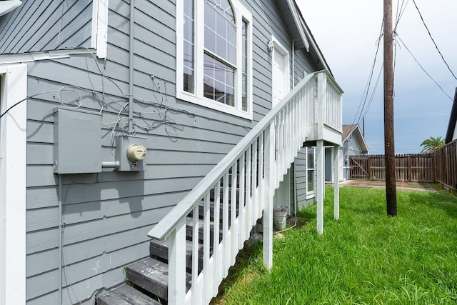 view of side of property featuring a yard