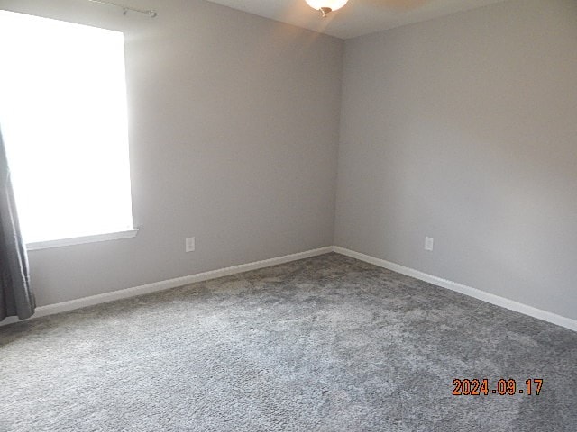 view of carpeted spare room