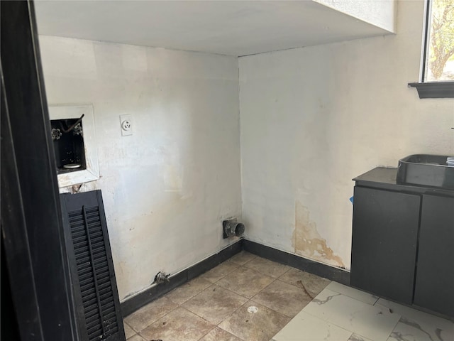 laundry room featuring hookup for an electric dryer