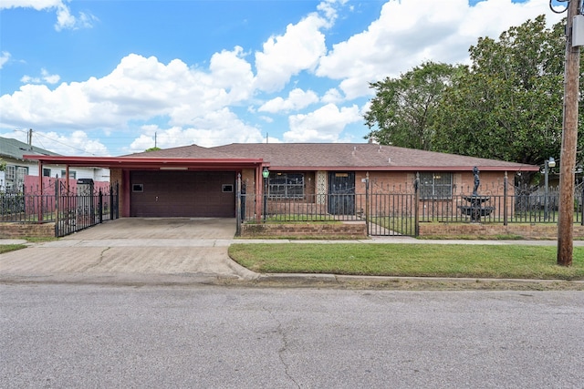 single story home featuring a front lawn and a garage